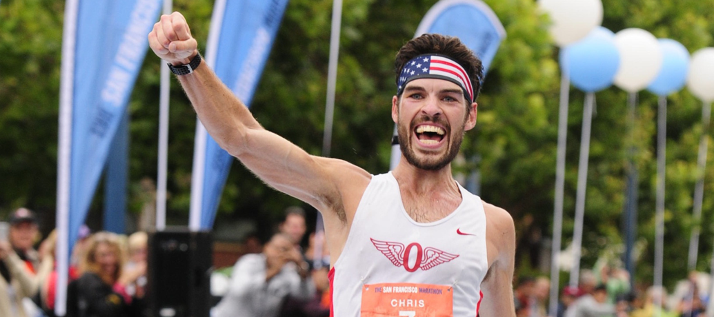 Chris Mocko cheers in excitement after winning the 2015 San Francisco Marathon