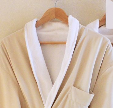 A luxury bath robe set aside for one of the individuals getting a couples massage.