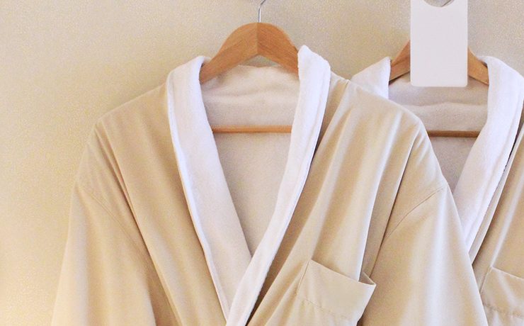 A luxury bath robe set aside for one of the individuals getting a couples massage.