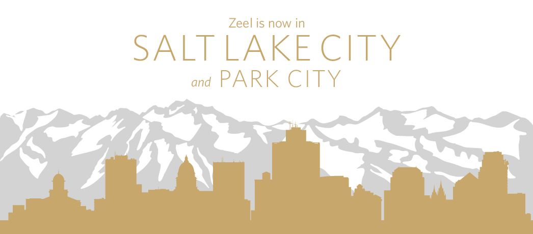 A graphic illustration of a city skyline silhouette in front of tall mountain peaks. The words 'Zeel is now in Salt Lake City and Park City' are printed across the top.