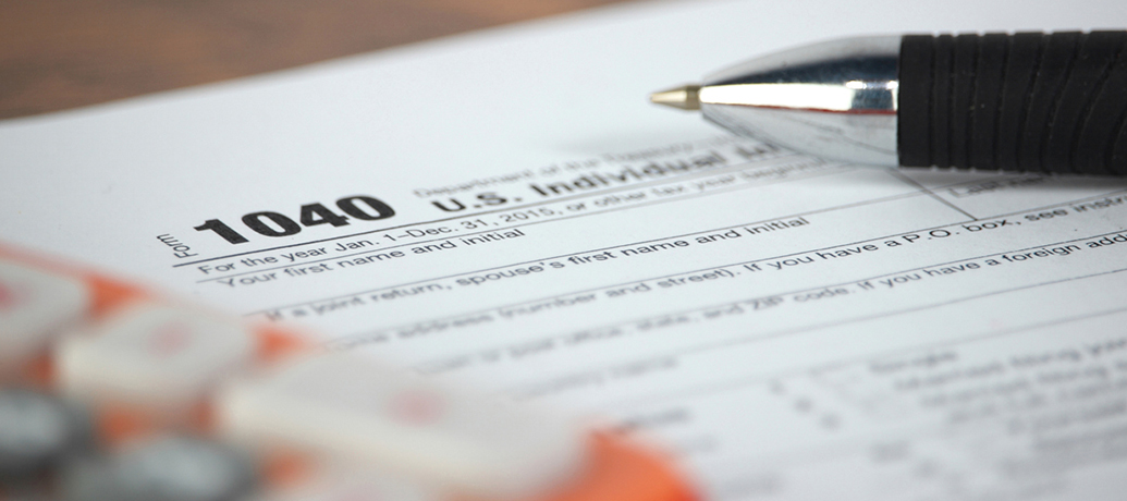 1040 IRS tax form used to notate tax deductions.