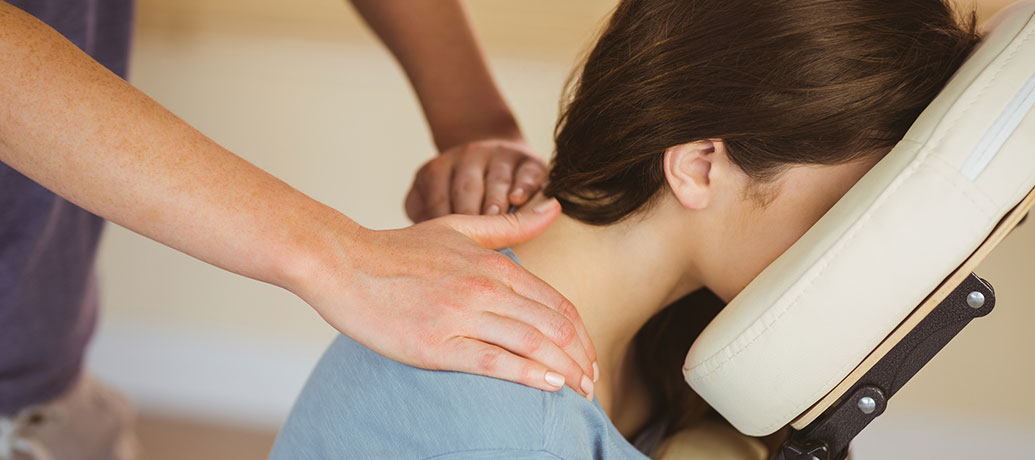 Woman getting chair massage