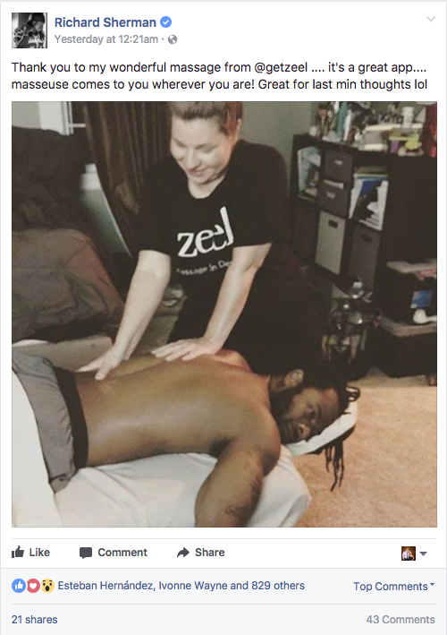 Richard Sherman of the Seattle Seahawks enjoying a Zeel sports massage in-home