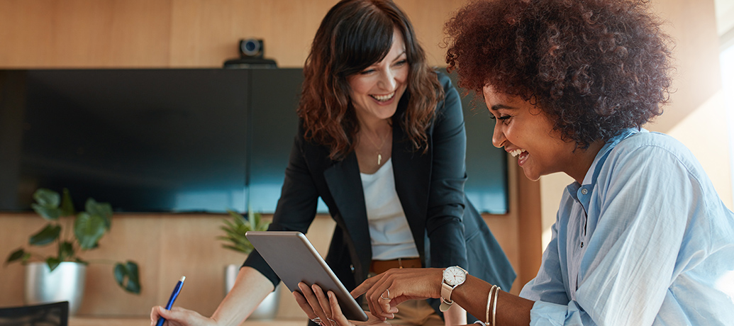 Happy employees smiling during meeting