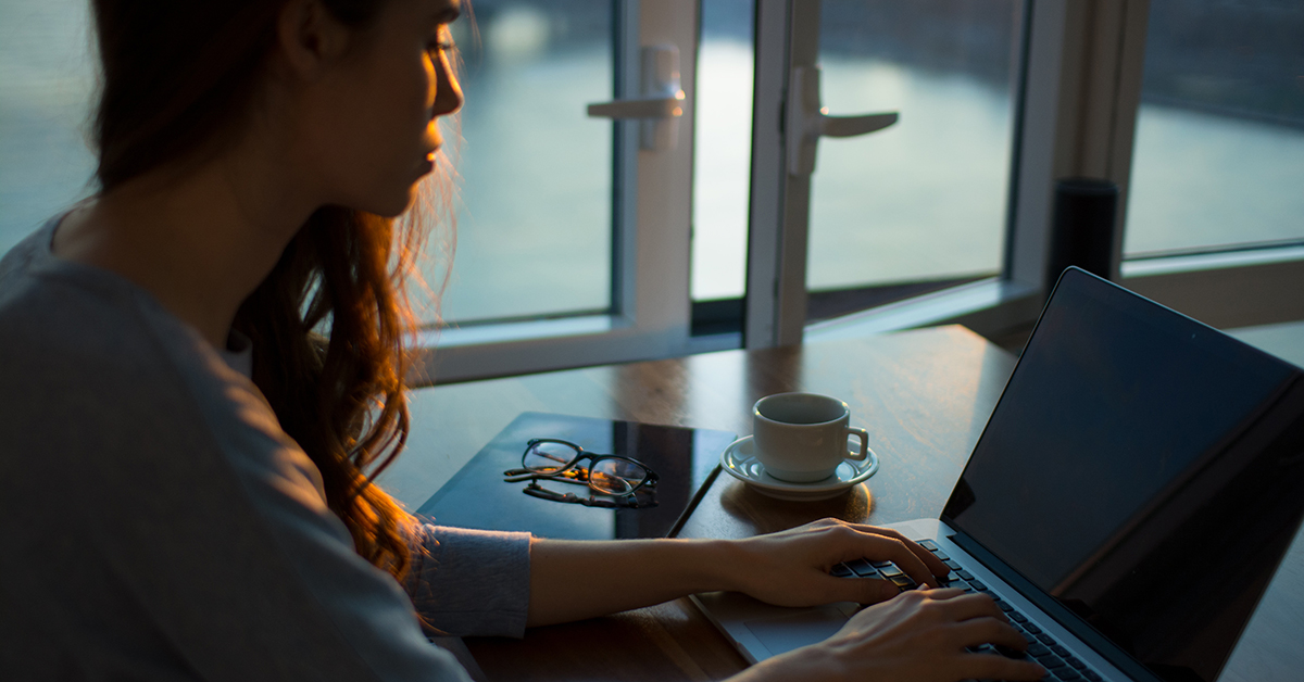 A woman working at home.