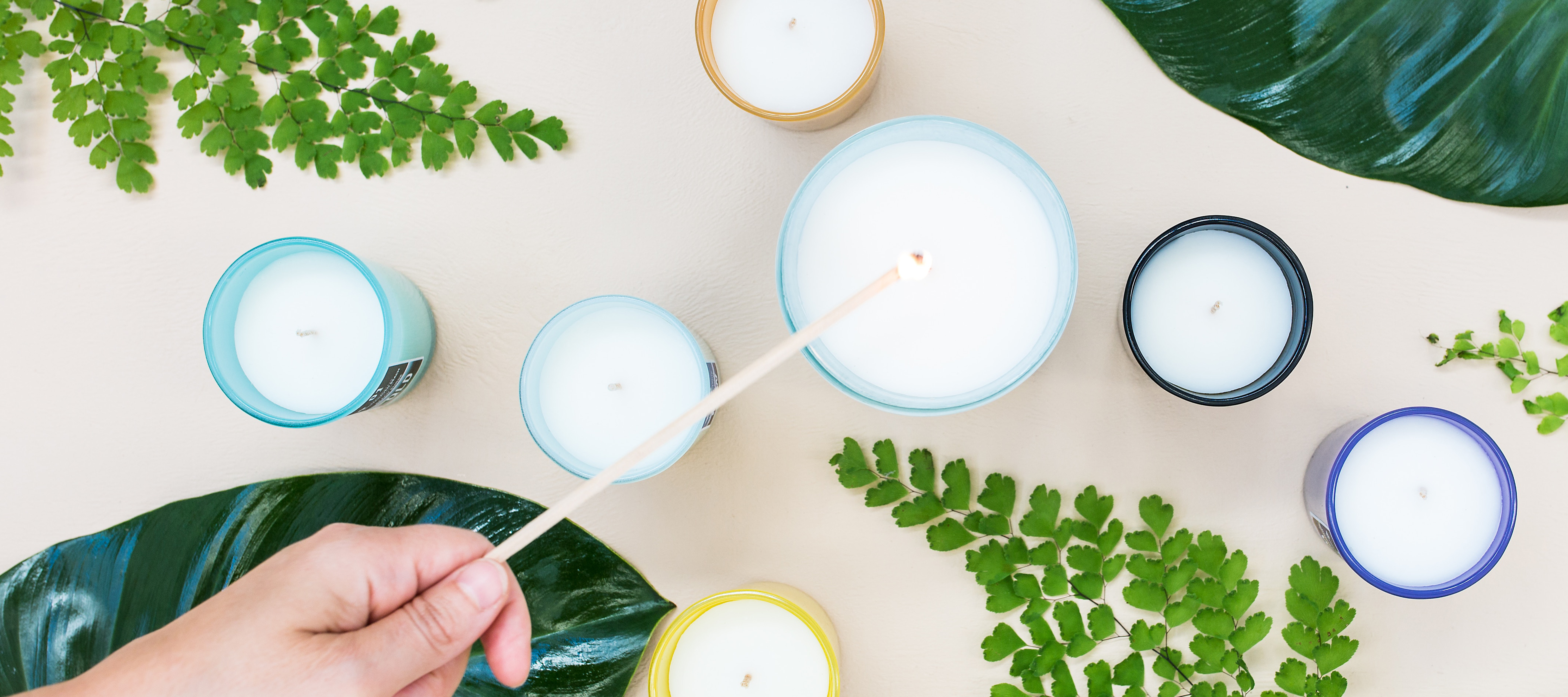 A woman lighting her new set of Spring candles.