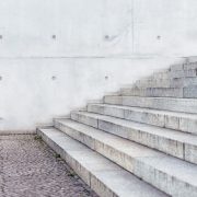 A man running up a set of stairs for his new year's resolution.