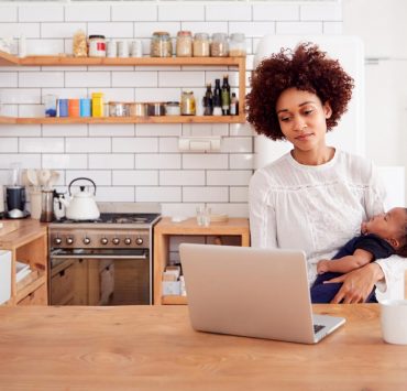 A woman doing research about COVID-19 to answer some of her questions about the virus.