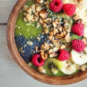 A smoothie bowl filled with various nutrients that are good for muscle recovery.