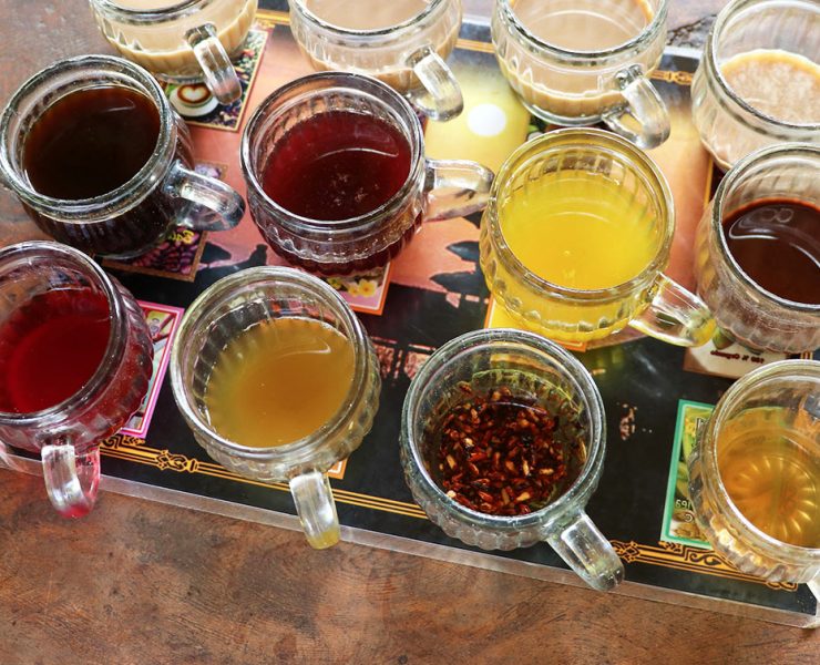A variety of teas sitting on a tray to choose from to help the user with brain fog.