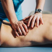 A man receiving a sports massage.