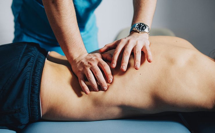 A man receiving a sports massage.