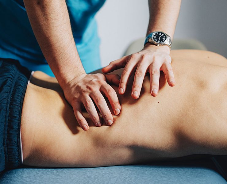 A man receiving a sports massage.