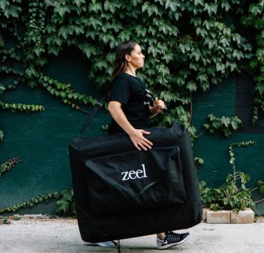 Zeel massage therapist with massage table